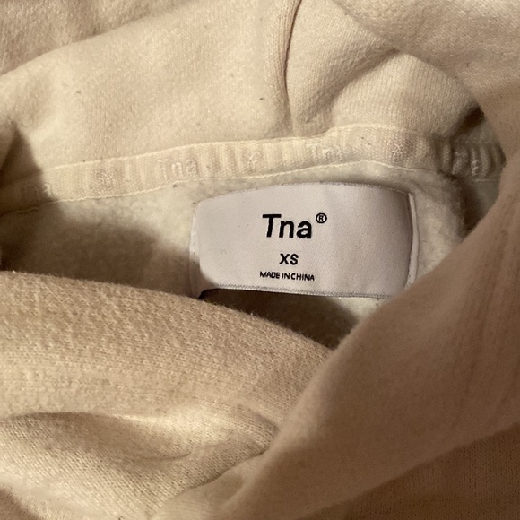 Used White TNA 1997 Sweater. has a few stains but can easily be removed!! - Picture 2 of 3